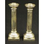 Pair Greek silver column candlesticks