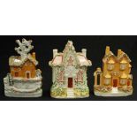 Three C19th Staffordshire house figurines