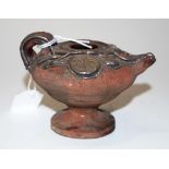 Roman style pottery oil lamp