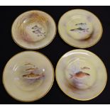 Four Royal Doulton handpainted fish cabinet plates