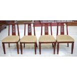 Four Eastern dining chairs