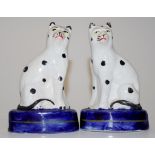 Pair of antique Staffordshire cat figurines