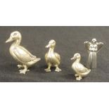 Three graduated sterling silver ducks