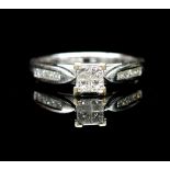 Princess cut diamond and 18ct white gold ring