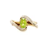 Peridot, diamond and 9ct yellow gold ring