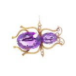 A good antique 15ct yellow gold and amethyst bug