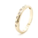 Punch set diamond and 9ct yellow gold ring