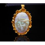 Carved opal and 18ct yellow gold pendant brooch
