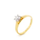 A good diamond solitaire and 18ct yellow gold ring