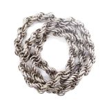 A heavy silver chain necklace