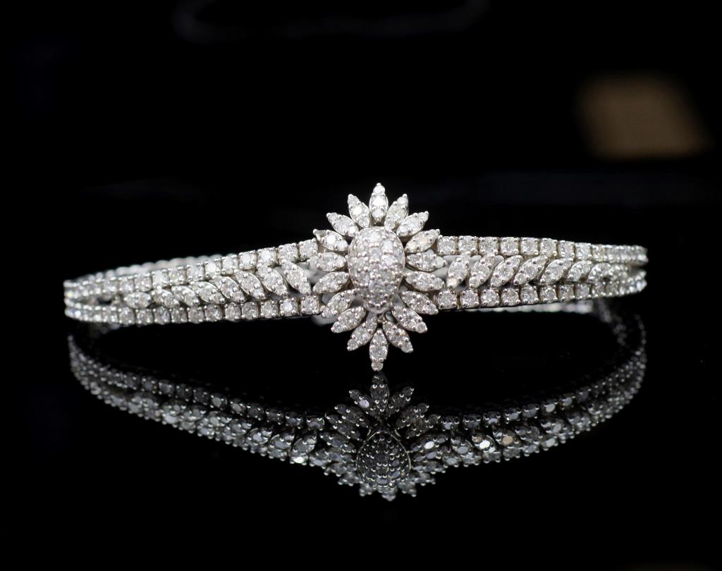 Diamond cluster and 18ct white gold bracelet