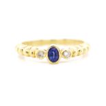 Sapphire and diamond set 18ct yellow gold ring