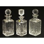 Three various cut crystal decanters