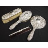 Four piece sterling silver dressing table set