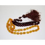 Two various faux amber necklaces