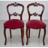 Pair of carved balloon back chairs