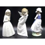 Three various Nao figurines