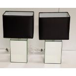 Pair of mirror based electric lamps