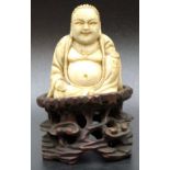 Chinese carved ivory Buddha & stand