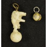 Two Oriental carved ivory charms
