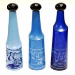 Three Salvador Dali glass bottles