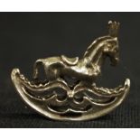 Miniature silver rocking horse figure