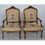 Pair of Louis XV style walnut armchairs