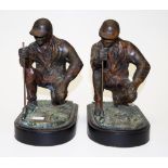 Pair of bronzed golfer bookends