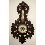 19th century Black Forest carved walnut barometer