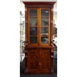 Antique mahogany elevated bookcase