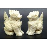 Two Oriental carved Temple Dogs