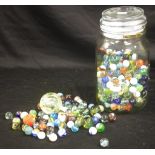 Jar of vintage playing glass marbles