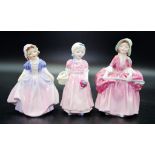 Three early Royal Doulton figures
