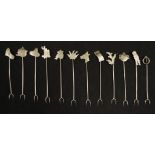 Twelve sterling silver hors d'ouevres forks