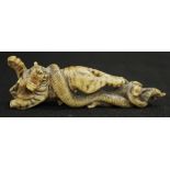 Oriental carved ivory tiger & snake figure