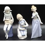 Three various Nao figurines