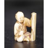 Japanese carved ivory Seated Man okimono