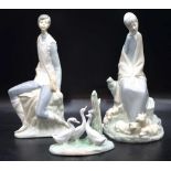 Three various Nao figurines