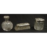 Three various Edward VII silver topped toilet jars