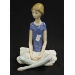 Lladro seated Ballerina figurine