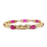 Created gemstone and yellow gold bracelet