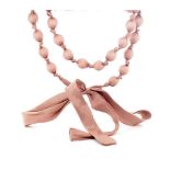 Knotted silk opera length necklace