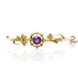 Edwardian amethyst and 9ct yellow gold bangle