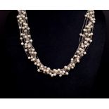 Mutli strand pearl and chain necklace