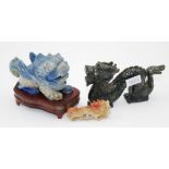 Three Chinese carved hard stone dragon ornaments