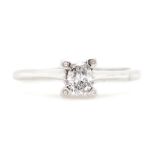 Oval cut diamond and 18ct white gold ring