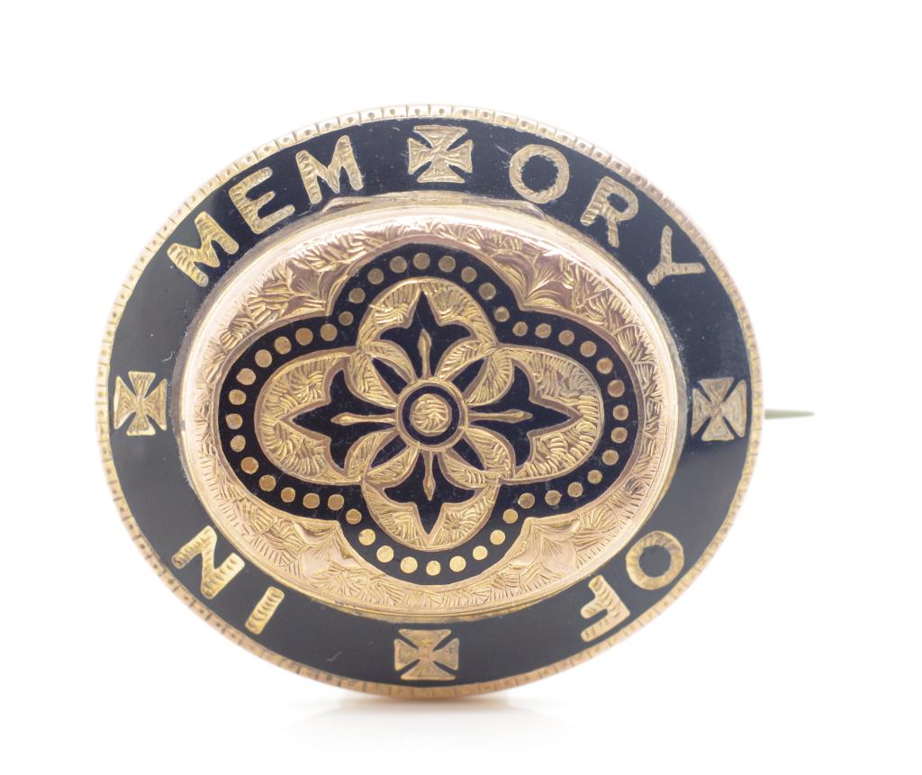 Victorian enamel and gilt metal mourning brooch