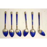 Six gold washed sterling & enameled spoons