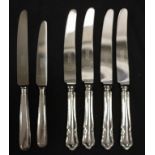 Six various sterling silver knives