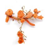 Carved coral and rose gold brooch